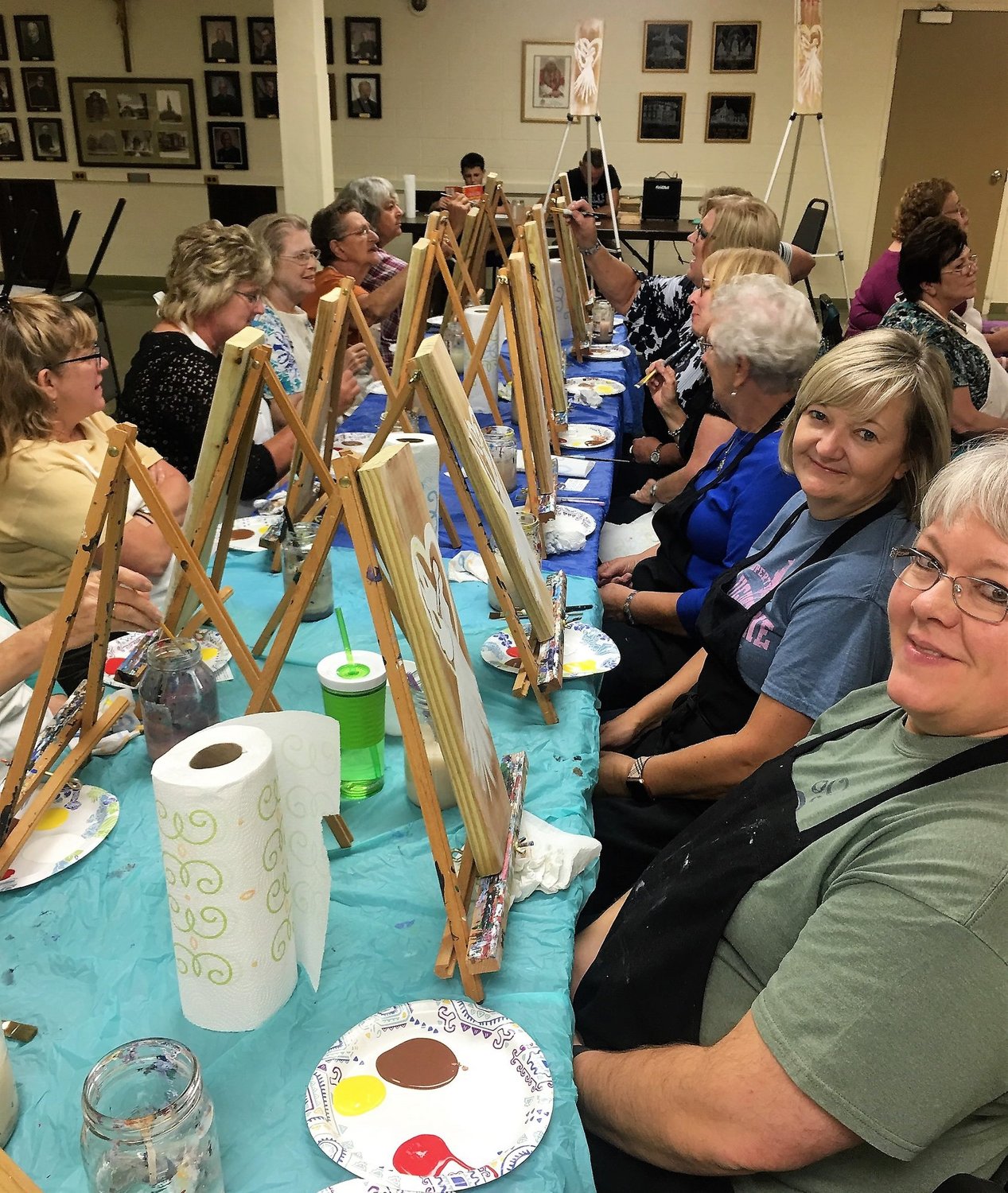 Members of the Daughters of Isabella from all over Missouri take part in a “painting night” activity during their state convention held at Ss. Peter and Paul parish in Boonville.